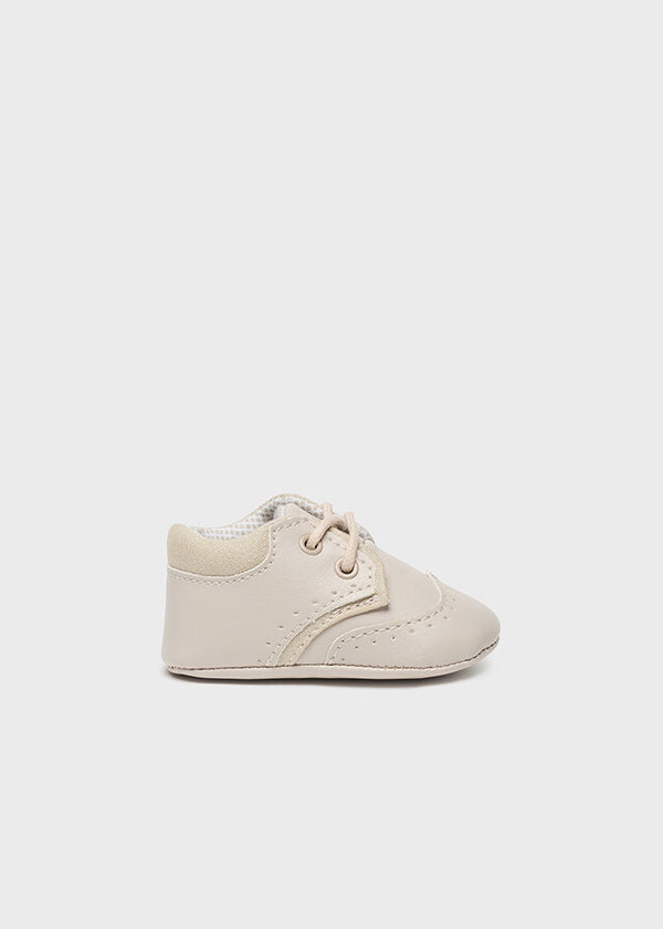 Sapatos cordões