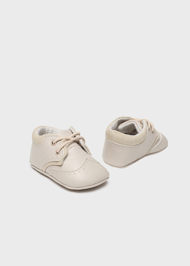 Sapatos cordões